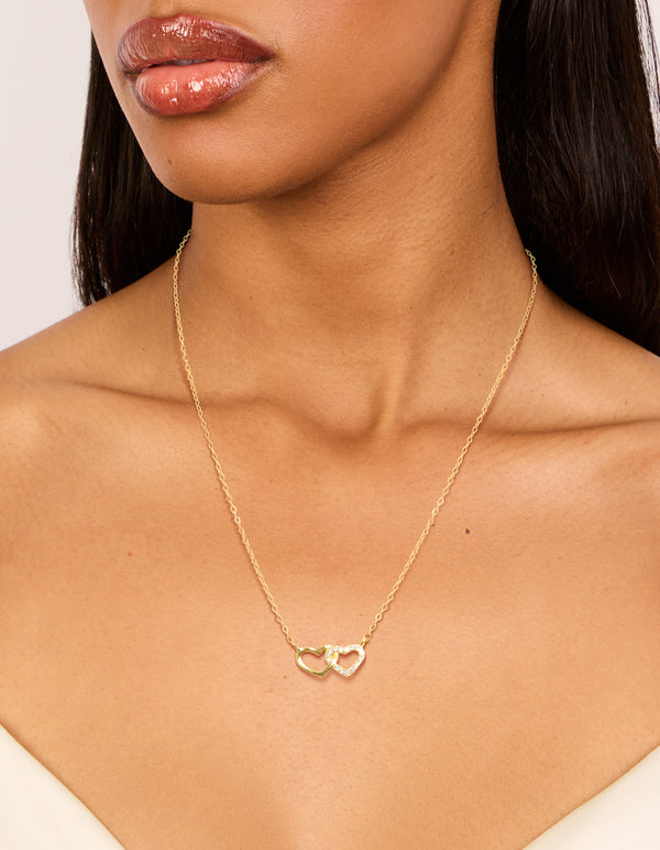 Elegant gold plated sterling silver double heart cubic zirconia necklace on neck view