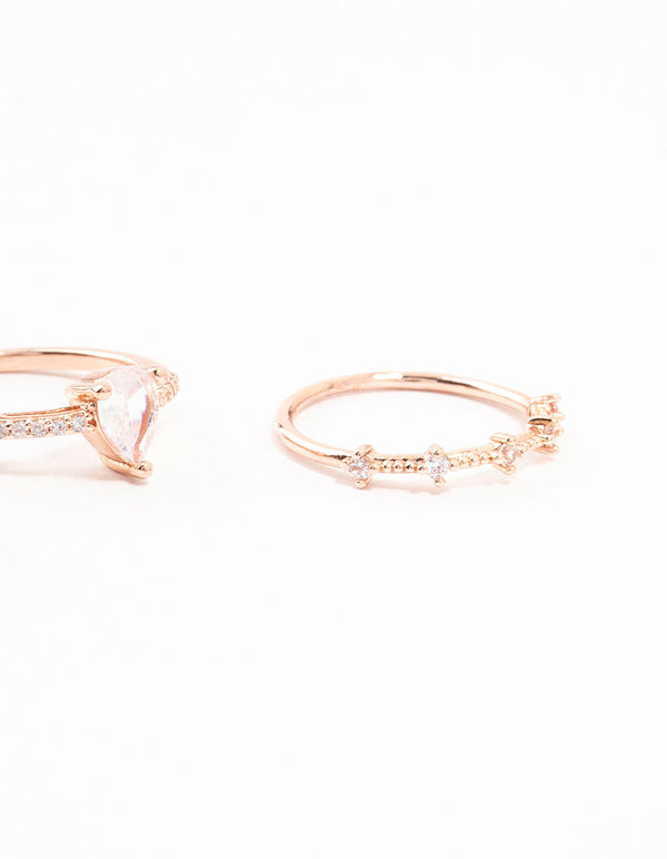 Crafted with rose gold plated elegant pear stacking rings in a 3-pack close up view