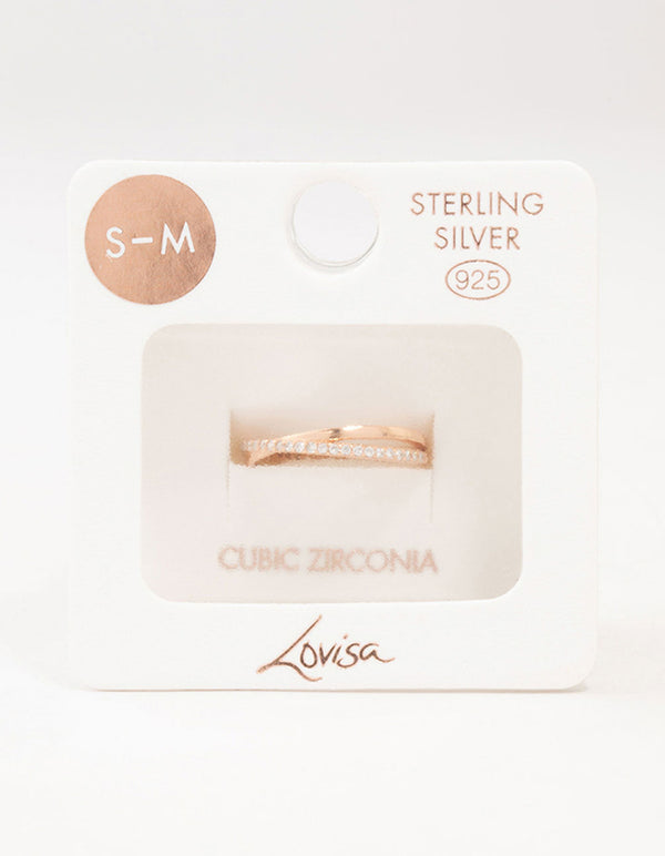 Showcasing rose gold plated sterling silver cubic zirconia crossover ring with packaging close up view