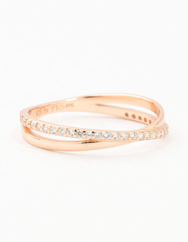 Featuring rose gold plated sterling silver cubic zirconia crossover ring in a side detail view