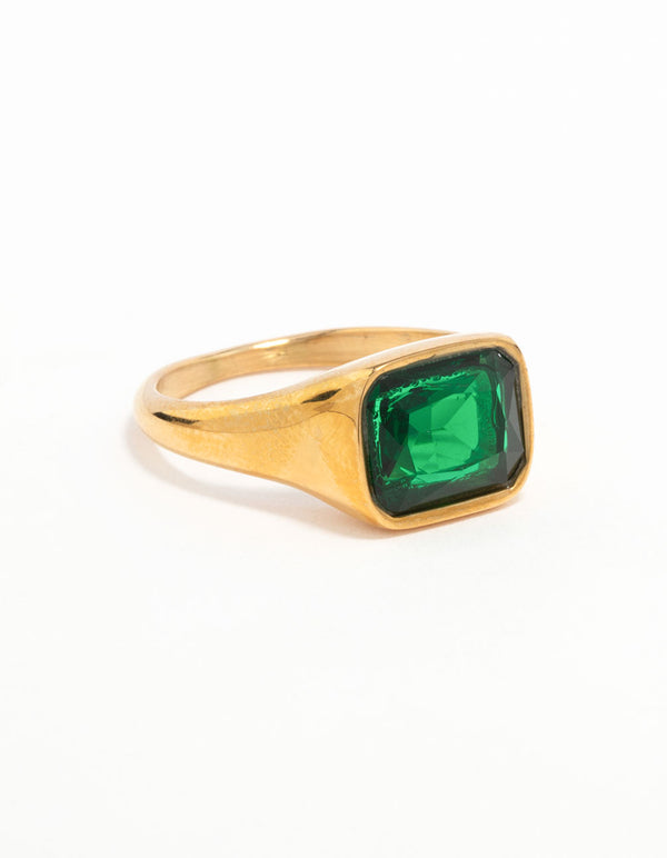 Showcasing waterproof gold plated stainless steel green cubic zirconia signet ring with crystal features in a polished finish front view