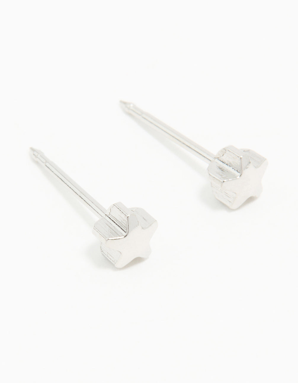 Discover surgical stainless steel 4MM piercing studs featuring celestial star design in silver with stud closure front view