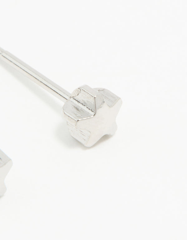 Crafted from surgical stainless steel 4MM piercing studs featuring celestial star design in silver with stud closure post detail view