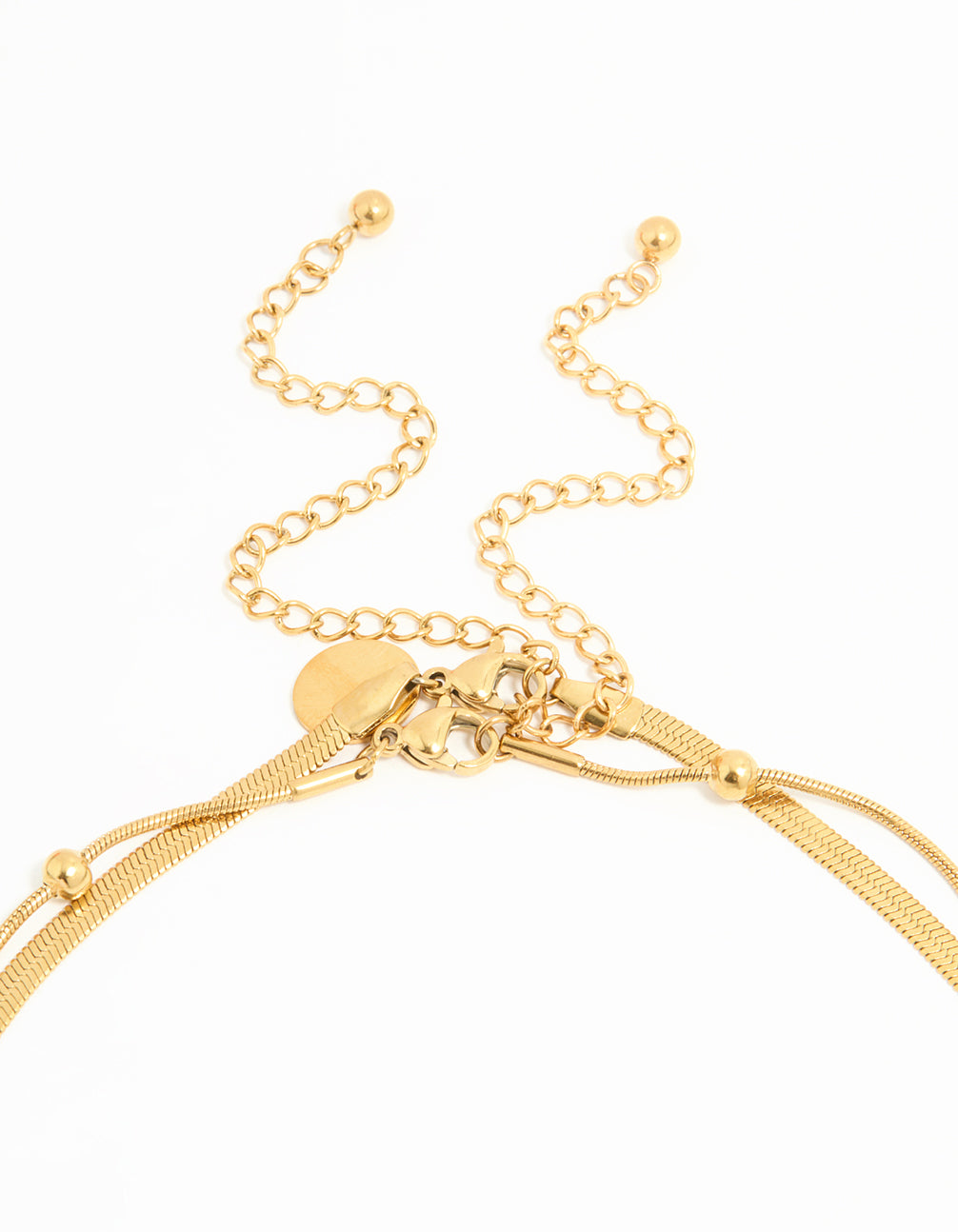 Highlighting a waterproof gold plated stainless steel ball chain layered necklace clasp detail view