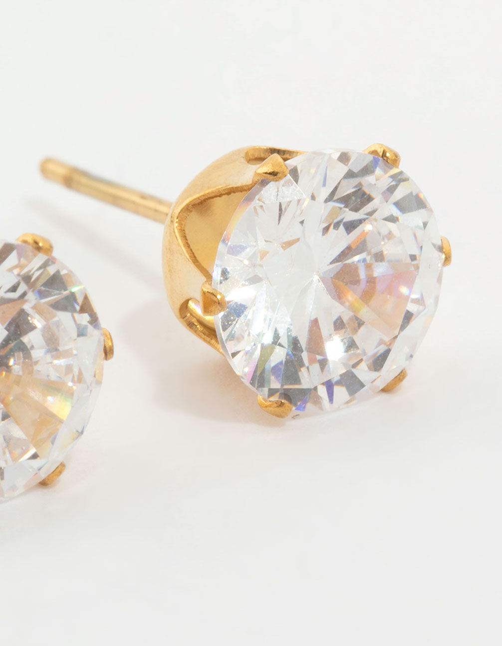Highlighting waterproof stainless steel cubic zirconia stud earrings in gold plated finish post detail view