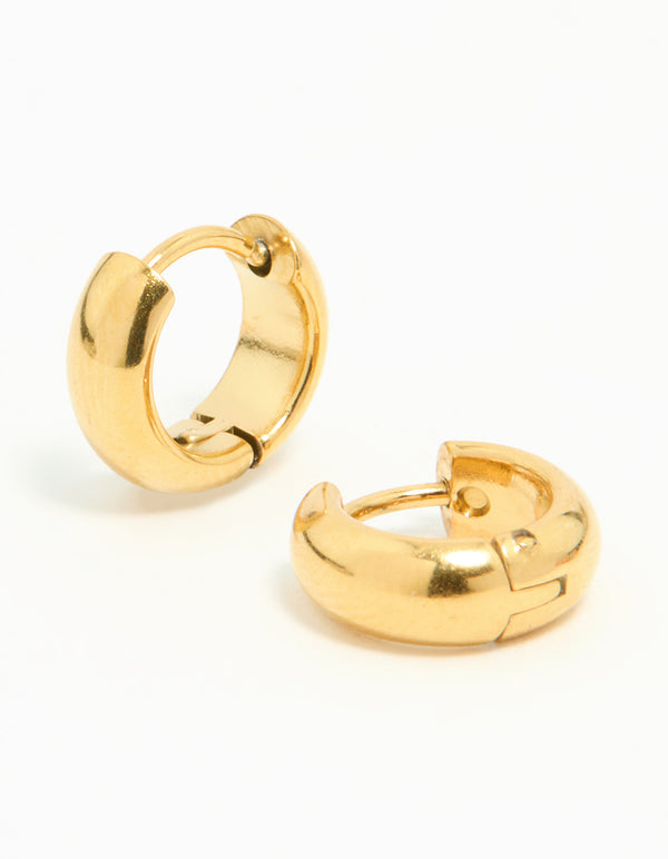 Featuring waterproof gold plated stainless steel chubby huggie earrings with closure front view