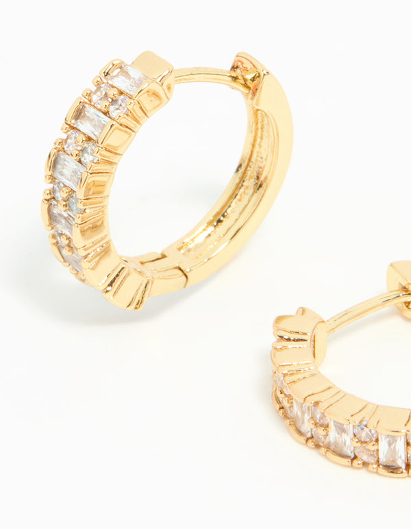 Explore gold plated diamante baguette pave hoop earrings with clear stones close up view