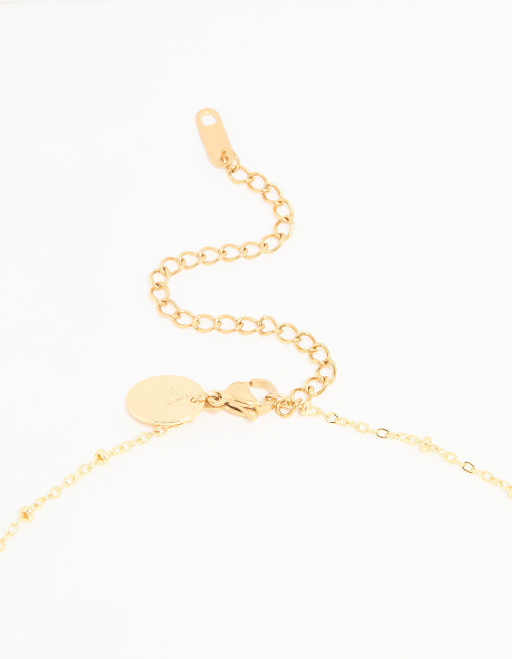 Highlighting the waterproof gold plated stainless steel evil eye pendant charms necklace with adjustable clasp detail view