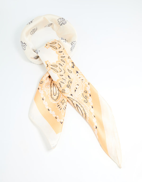 A stylish white fabric western scarf with paisley print in ivory, khaki, black, and wheat front view