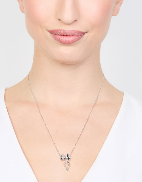 Silver Bow Twirl Pendant Necklace