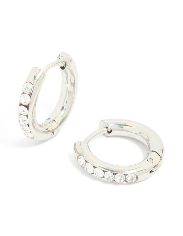 Showcasing waterproof stainless steel cubic zirconia round clicker huggie earrings crafted from silver in front view