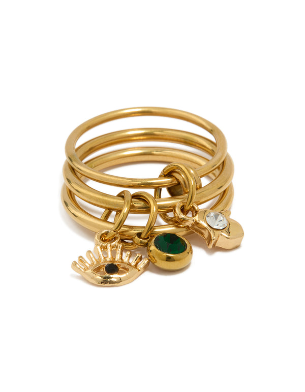 A waterproof gold plated stainless steel evil eye and hamsa hand charm stacked ring in forest green and clear accents close up view