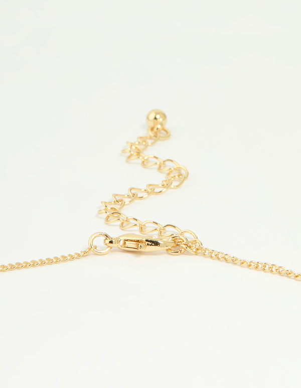 Highlighting the gold plated genuine shell letter M flower petal necklace with floral, initials, cubic zirconia pendant and adjustable lobster clasp detail view