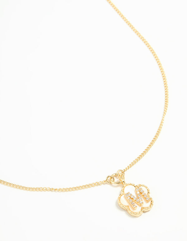 Showcasing a gold plated genuine shell letter M flower petal necklace featuring floral design with initials, cubic zirconia pendant close up view