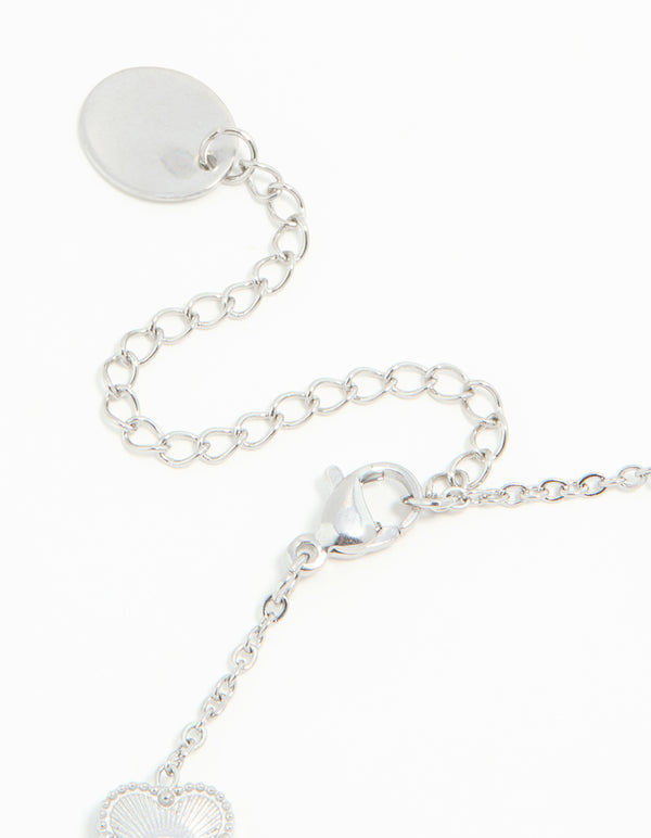 Designed with waterproof stainless steel flower petal charm bracelet in silver closure detail view