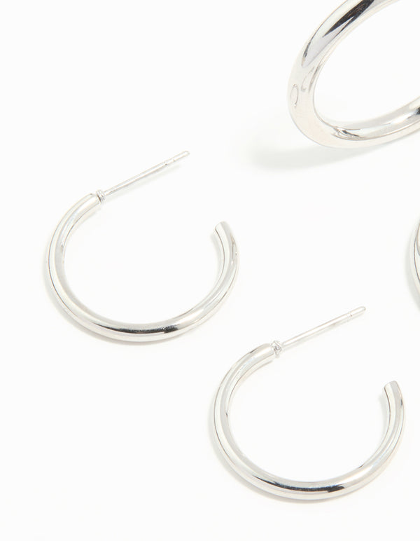 Crafted from waterproof stainless steel, these twisted and smooth hoop earrings feature a 3-pack design in silver tone close up view