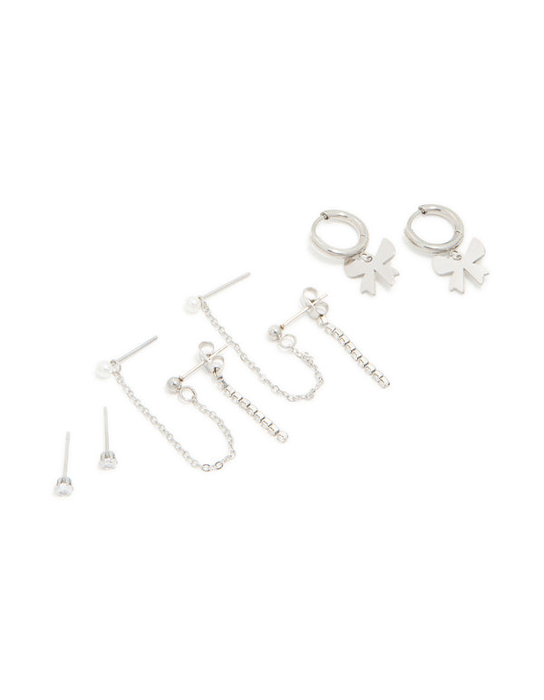 Discover waterproof stainless steel cubic zirconia bow chain earrings featuring charm details with huggie closure in silver 3-pack front view
