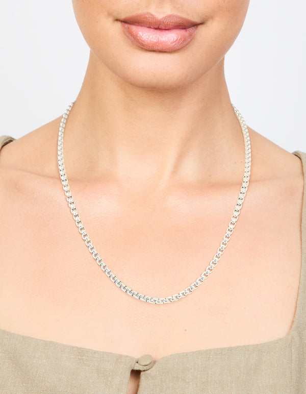 Featuring a waterproof stainless steel round box chain short necklace in silver on neck view