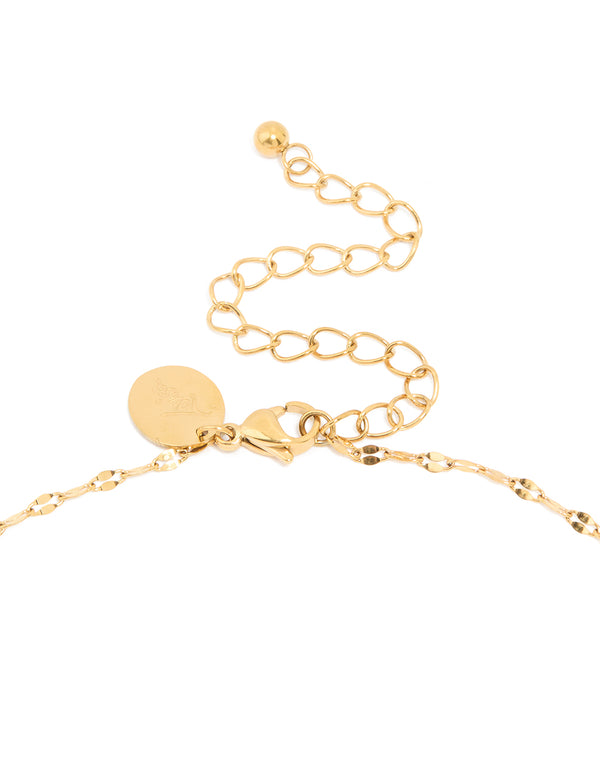 Highlighting a dainty waterproof gothic cross pendant fine necklace with cubic zirconia stones, crafted from gold plated stainless steel clasp detail view