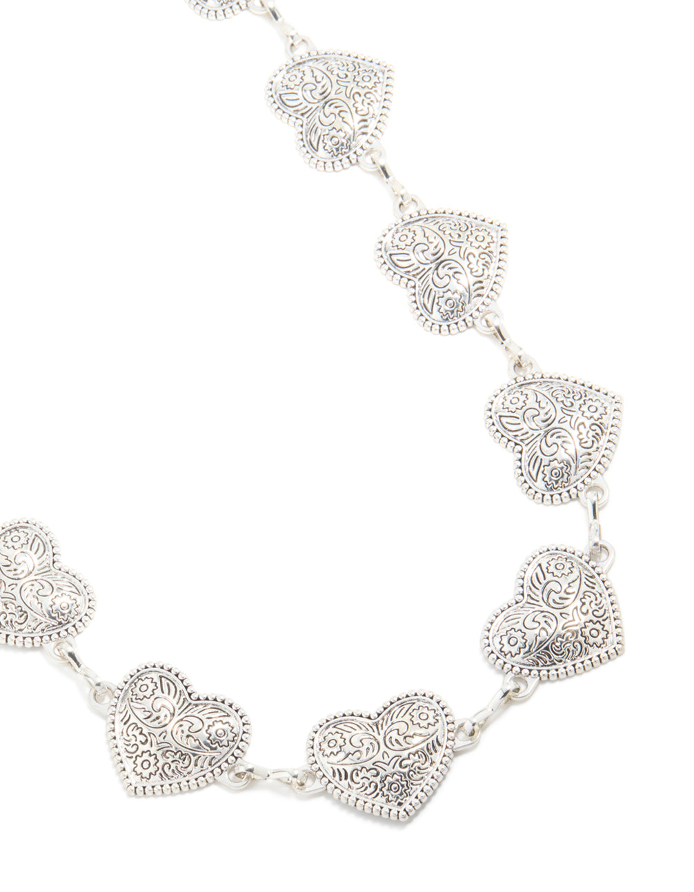 Discover this embellished waisted silver heart western belt detail view