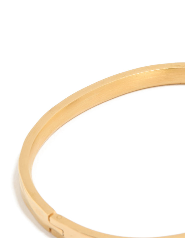 Stunning waterproof gold plated stainless steel hammered hinged bangle highlighting the textured finish close up view