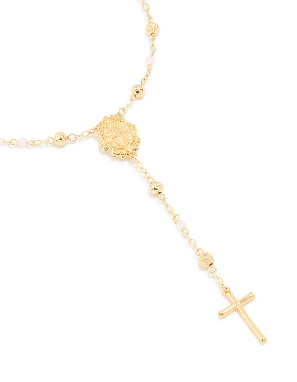 Showcasing a gold plated pink beaded lariat cross necklace featuring balls, beads close up view