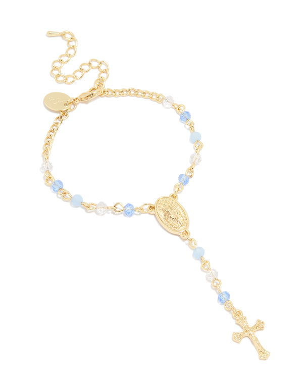 Beautifully crafted gold plated bracelet with blue beads featuring cross details front view