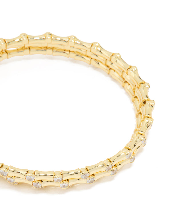 Discover this gold plated diamante spiral bangle close up view