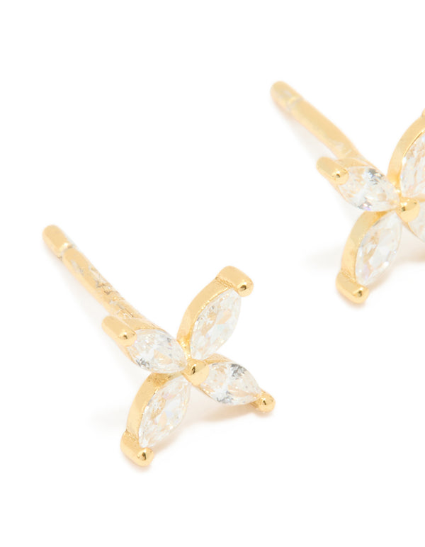 Designed with waterproof floral stainless steel and cubic zirconia, these stud earrings in gold plated finish featuring clear accents close up view