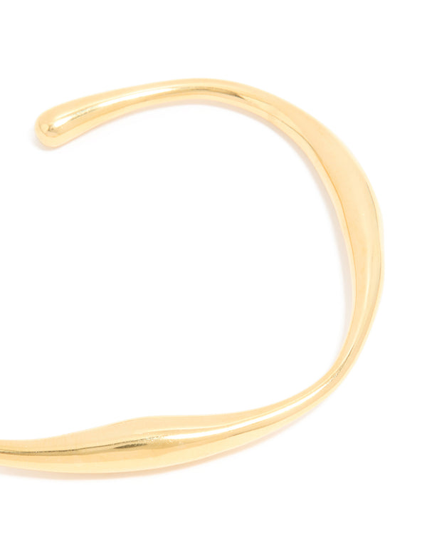 Featuring a waterproof gold plated stainless steel organic open wrist cuff close up view