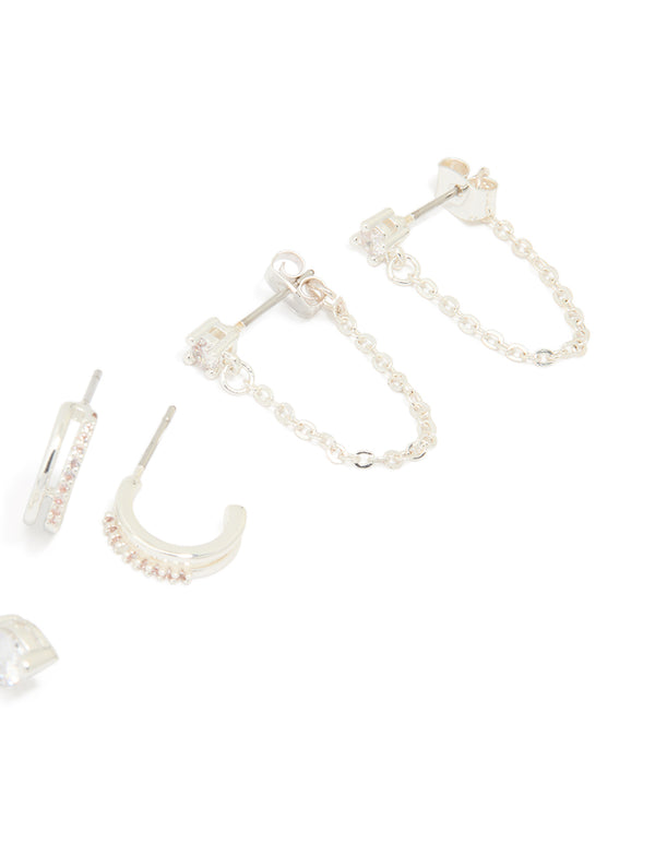 Featuring dainty charm heart huggie and stud earrings in silver plated brass with cubic zirconia 4-pack post detail view