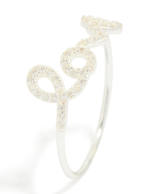 Designed with sterling silver and cubic zirconia this love ring displays script detailing in white with clear stone style close up view