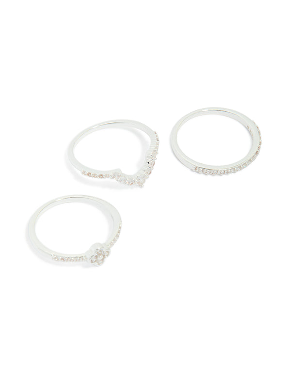 Showcasing silver plated cubic zirconia dainty flower and band stacking rings 3-pack in white front view