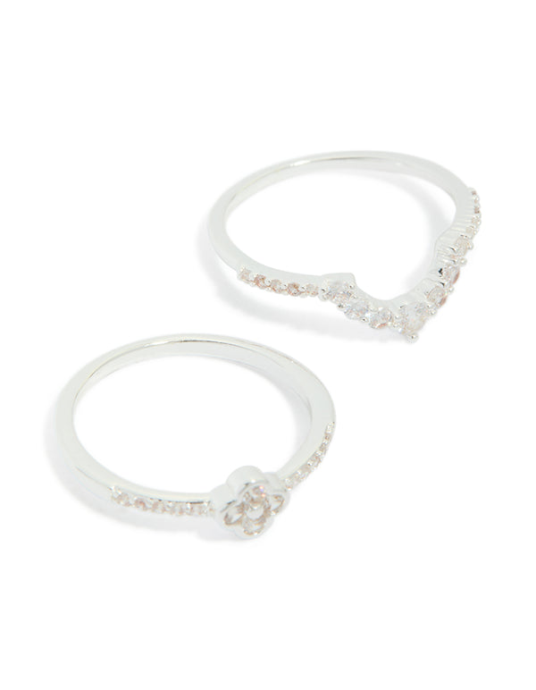 Featuring silver plated cubic zirconia dainty flower and band stacking rings 3-pack with white close up view