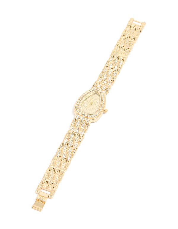 Beautifully designed this gold diamante statement watch features stone dial look, analog display, link band in casual styling for women front view
