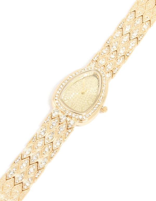 Beautifully crafted, this gold diamante statement watch features stone dial look, analog display, link band in casual styling for women watch face detail view