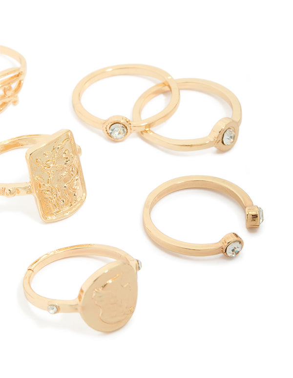 Showcasing gold diamante Roman numeral rings 9-pack with charm details, disc features and dainty styling side detail view