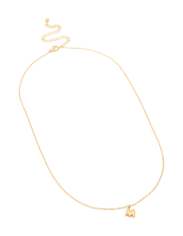 Introducing a waterproof gold plated stainless steel mini bubble letter M initial pendant necklace in dainty style front view