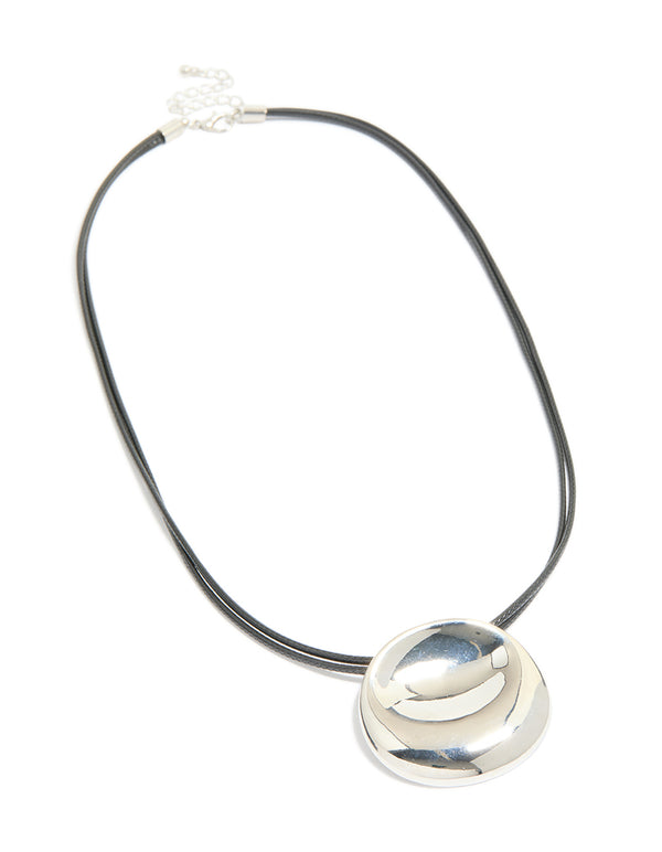 Featuring a silver boho pendant cord necklace with statement design in black front view