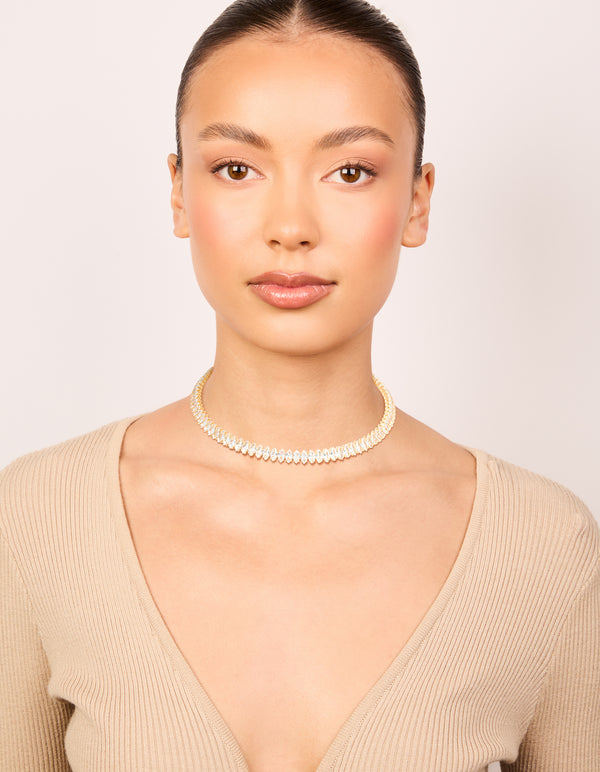 Featuring a gold cubic zirconia choker necklace on model view
