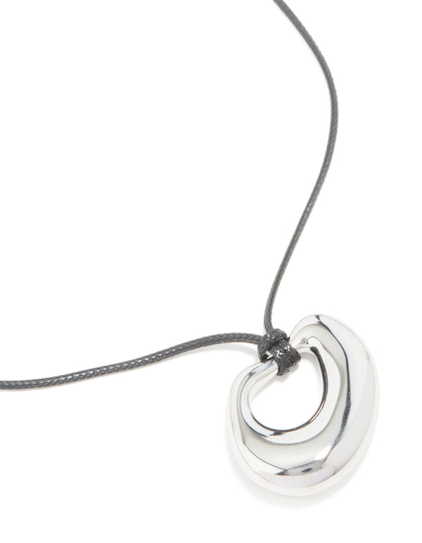 Showcasing a pendant featuring waterproof stainless steel and cord necklace in silver and dimgrey close up view