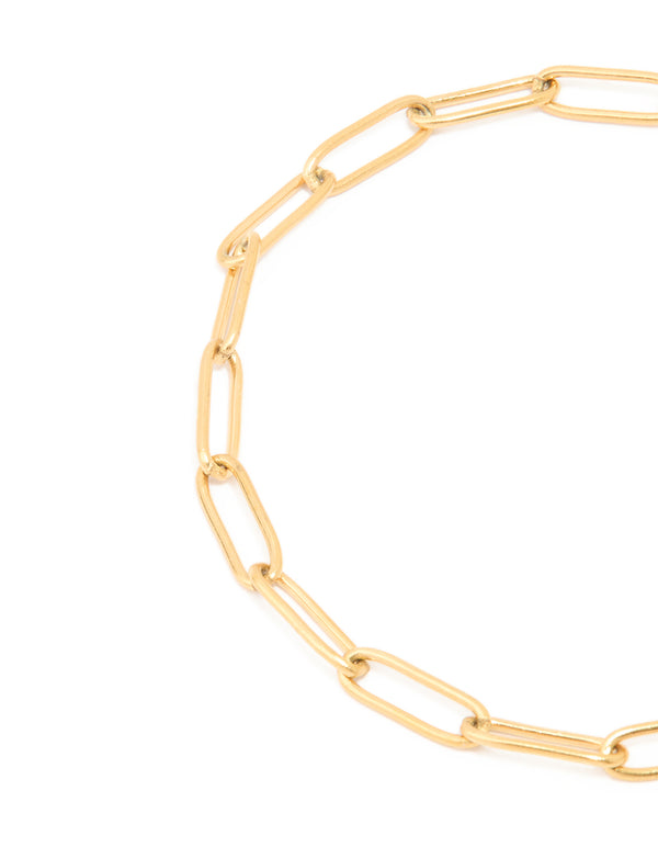 Presenting a waterproof gold plated stainless steel fine link dainty clasp bracelet in gold close up view
