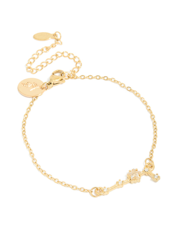Featuring a waterproof celestial bracelet made of gold plated stainless steel with cubic zirconia and star sign accents front view