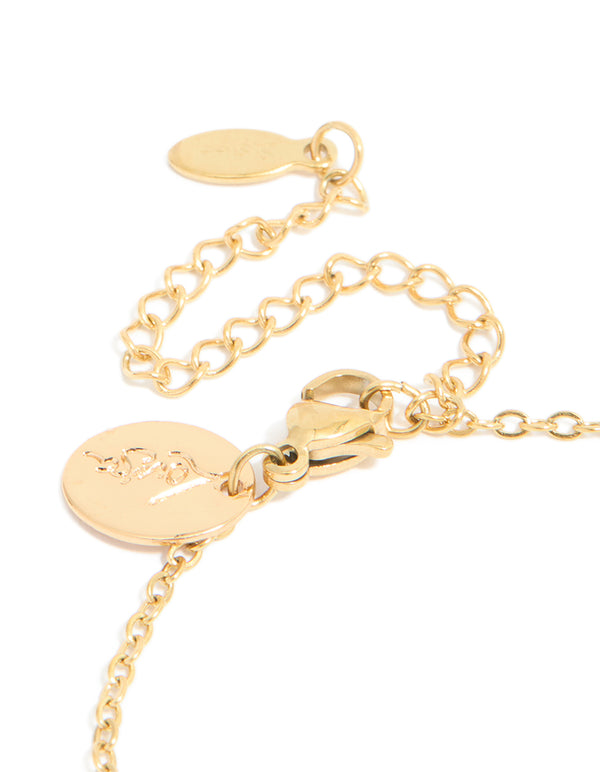 Presenting a waterproof celestial bracelet featuring gold plated stainless steel with cubic zirconia and star sign closure detail view