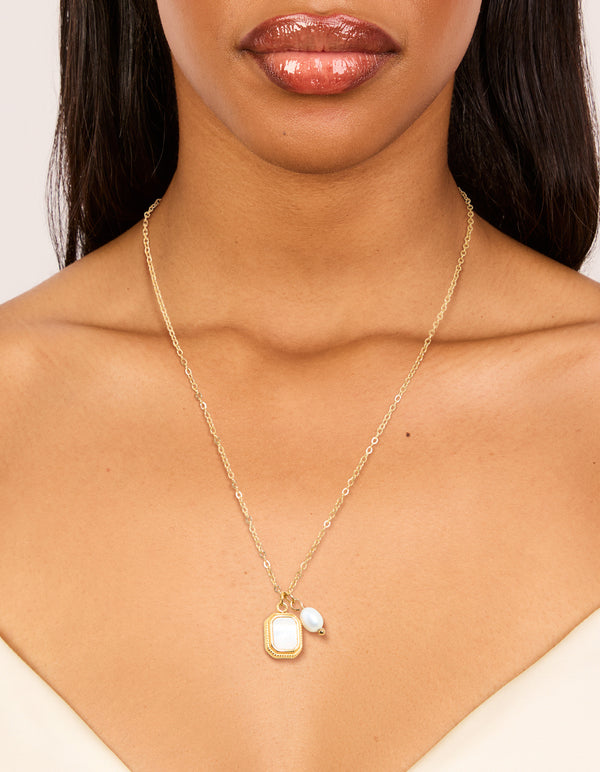 Elegant waterproof gold plated stainless steel necklace featuring pearl charm and square pendant on neck view