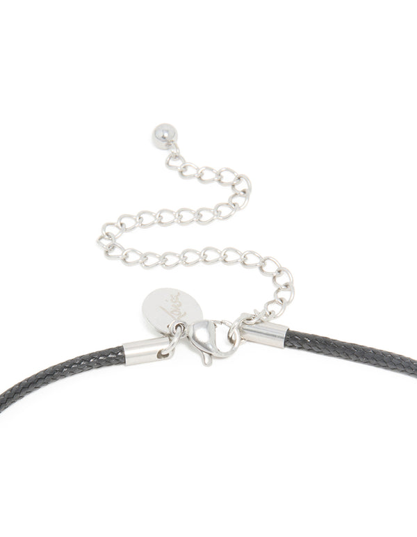 Featuring a waterproof stainless steel organic pendant necklace with black cord and silver closure clasp detail view
