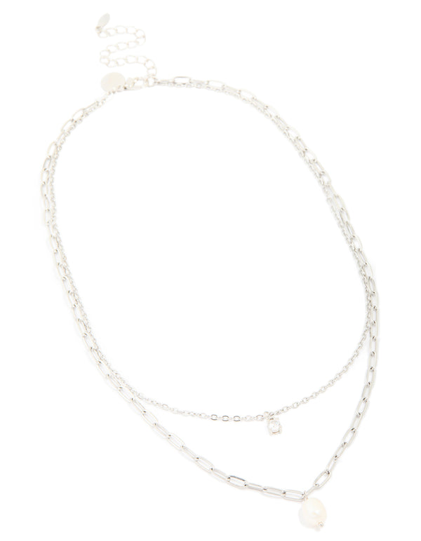 Crafted from waterproof stainless steel this diamante and freshwater pearl chain layered necklace features in silver ivory front view