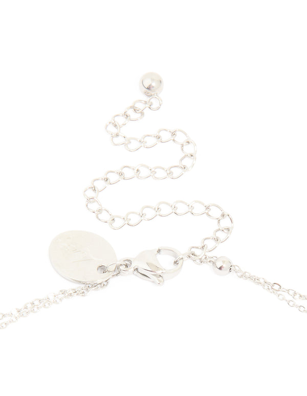 Crafted from waterproof stainless steel, this starfish and shell layered necklace with balls, charm, and pearl in silver highlights ocean design clasp detail view