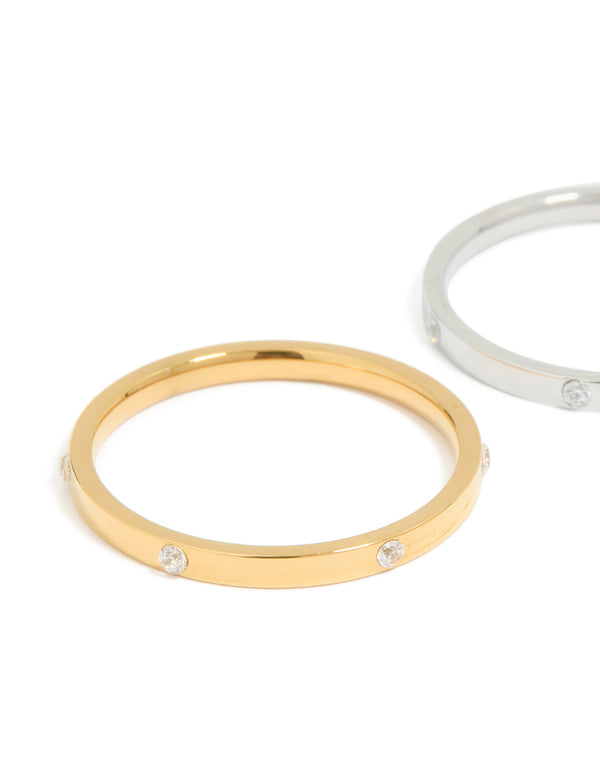 Crafted from waterproof mixed metals plated stainless steel, skinny cubic zirconia dot rings 2-pack in gold and silver close up view
