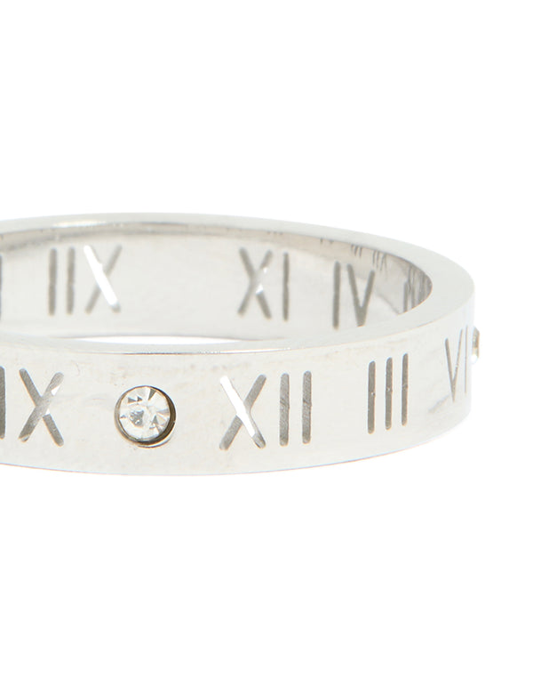 Finely detailed waterproof stainless steel cubic zirconia roman numeral ring in silver and clear stone close up view